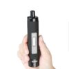 Yocan iShred dry herb vaporizer with built-in grinder in a hand