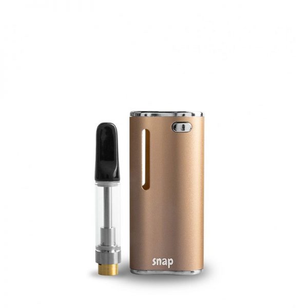 Exxus Snap oil cartridge vaporizer in gold with oil cartridge standing outside