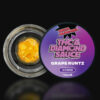 Delta Munchies THCA Diamond Sauce dabs in 1g container with Grape Runtz Hybrid strain showing product contents